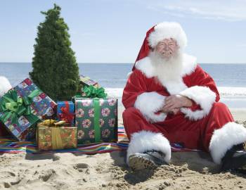 Santa sits on the beach!