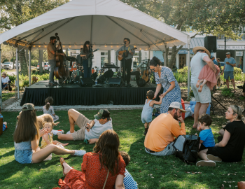People enjoying the bbq and music festival