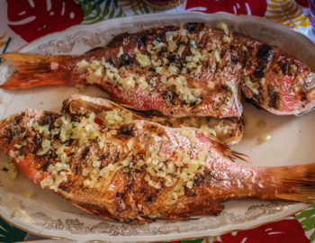 Guests enjoying the Feast of the Seven Fishes multi-course dinner at Tomasso at Turtle Point, Kiawah Island, South Carolina. Guests enjoying the Feast of the Seven Fishes multi-course dinner at Tomasso at Turtle Point, Kiawah Island, South Carolina.
