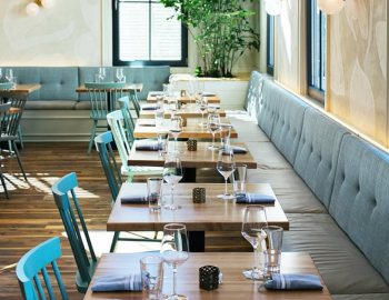 teal booths and tables in a restaurant