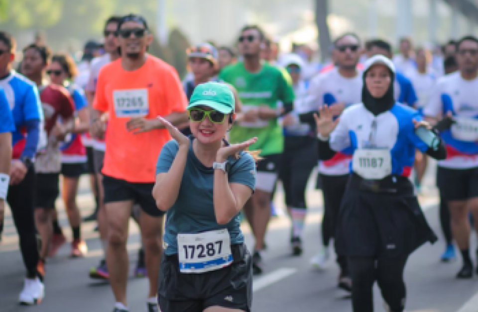 Runners making their way through the scenic marsh and live oaks during the Kiawah Island Marathon at West Beach Village, South Carolina.