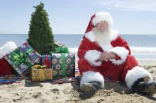 Santa sits on the beach!