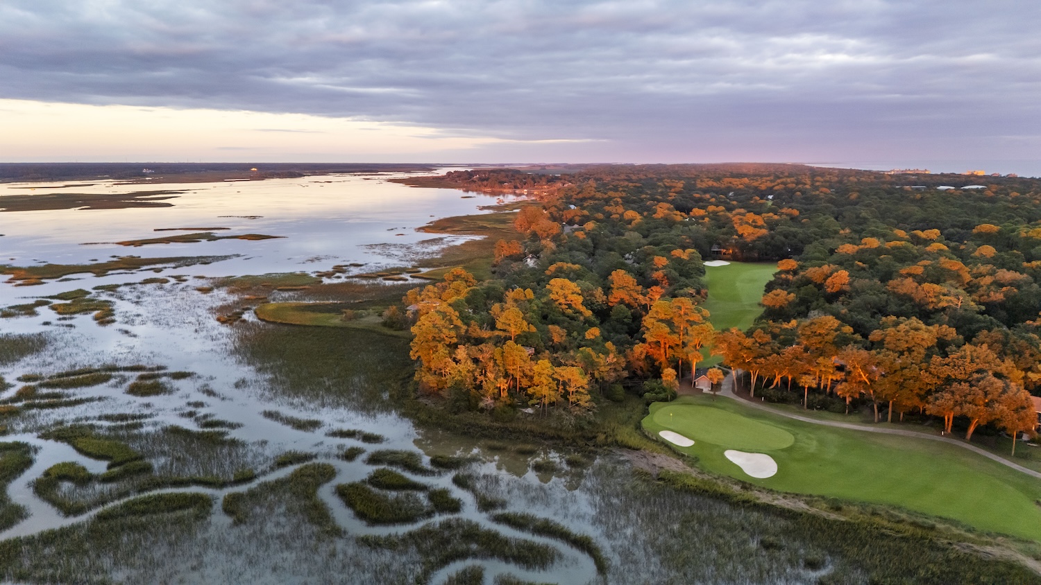 ariel of golf course with fall foliage