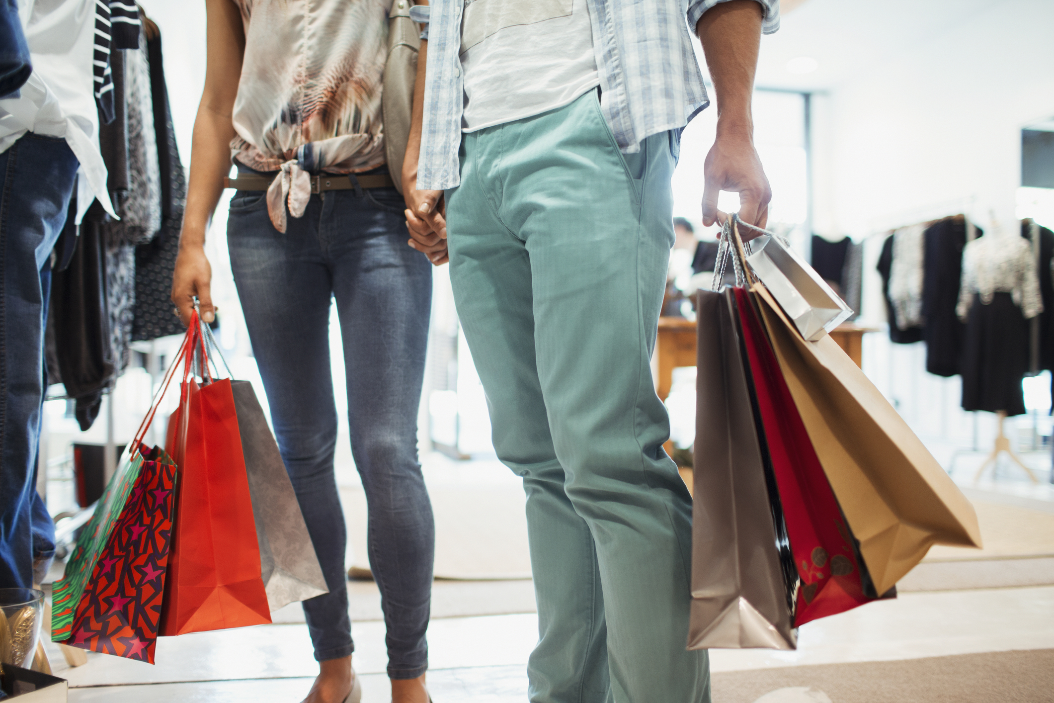 a couple shopping with bags