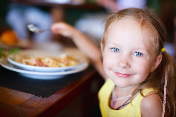 A child enjoy a meal at a family-friendly restaurant 
