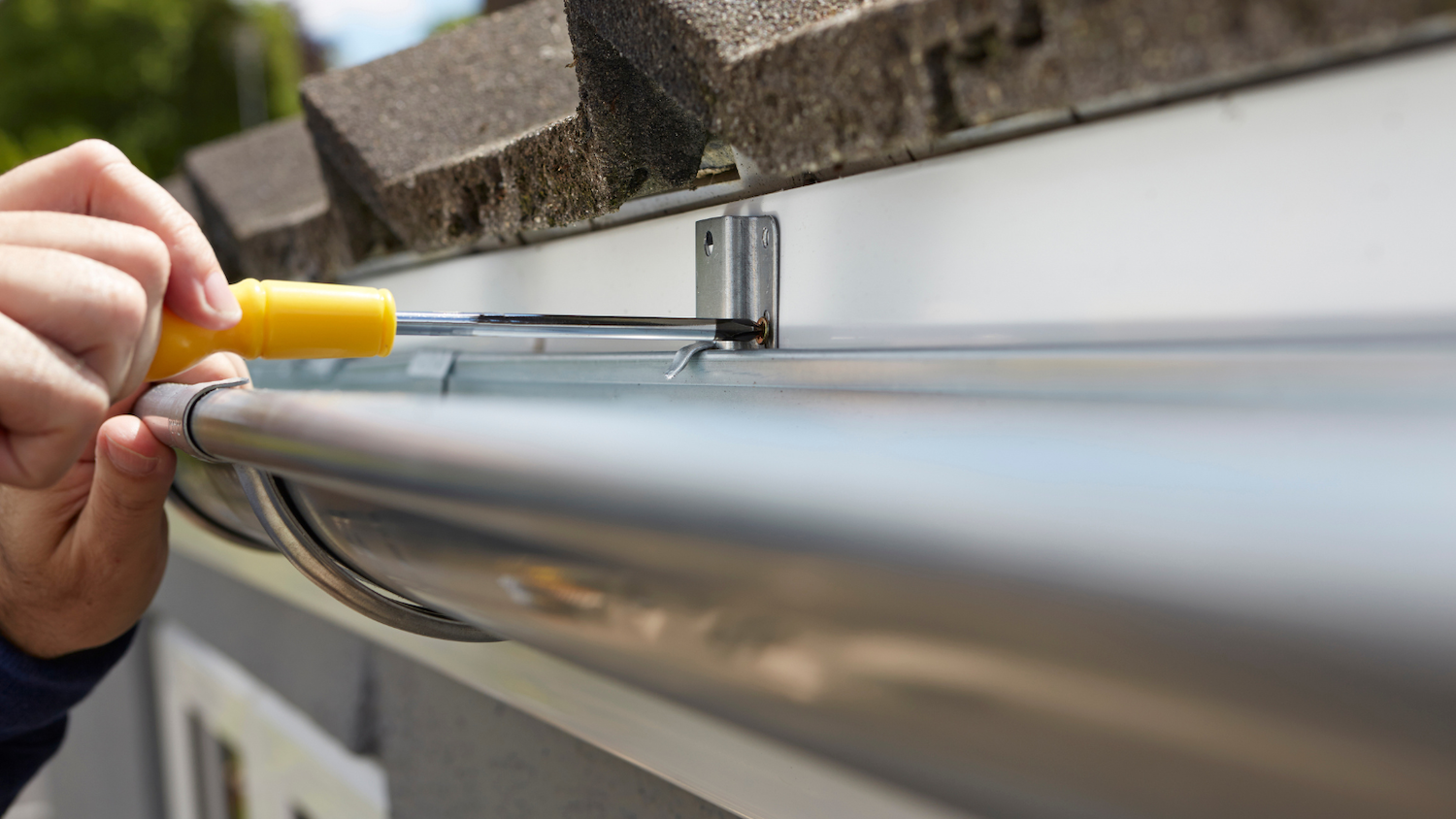 attaching gutters to home