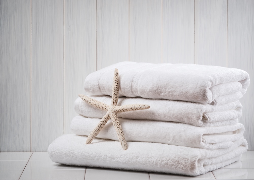 stack of towels with a starfish